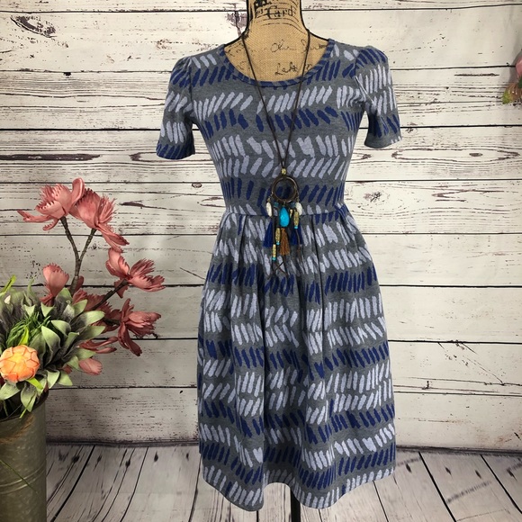 LuLaRoe Dresses & Skirts - LuLaRoe Amelia Abstract Printed Dress